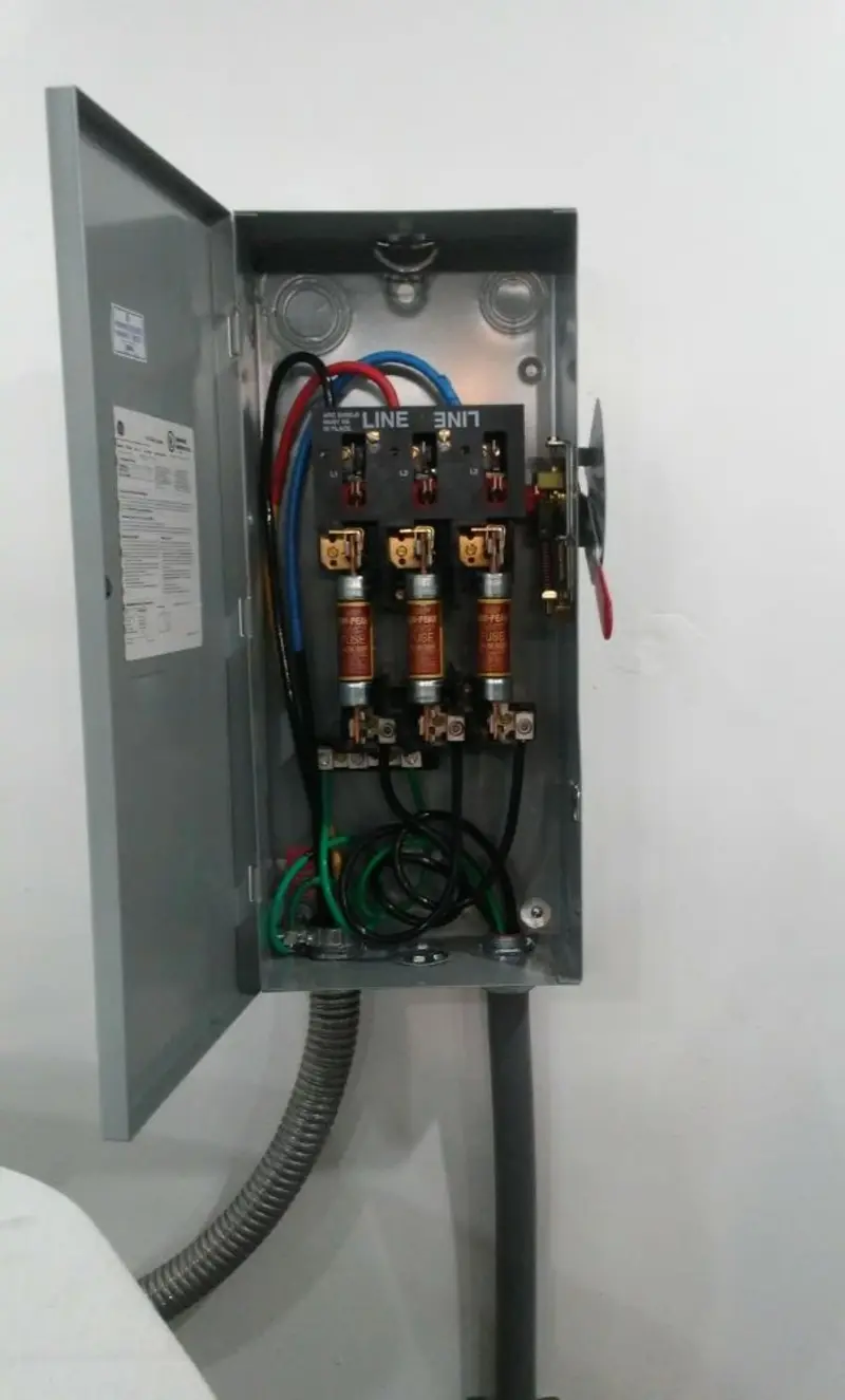 Three-phase disconnect switch installed for Smoke Detector Installation in Mountain View Acres
